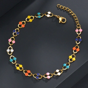 Detail of gold chain bracelet with colorful enamel beads and adjustable lobster clasp closure