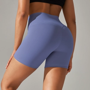 Detail of high-waist yoga shorts with U-shaped butt lift design in slate blue color