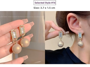 Detail showing elegant gold tassel earrings with champagne pearls and micro-pave crystals