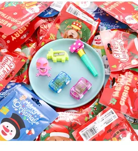 Christmas stationery gift set featuring colorful pull-back cars and festive packaging bags