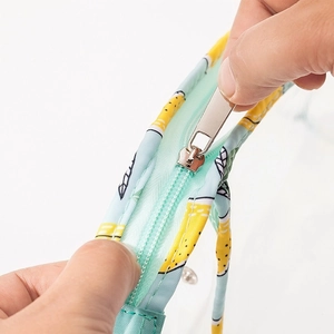 Waterproof clear PVC makeup bag set with cute pineapple print and blue trim detail