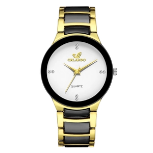 Elegant gold and black quartz watch with stainless steel band and rhinestone dial
