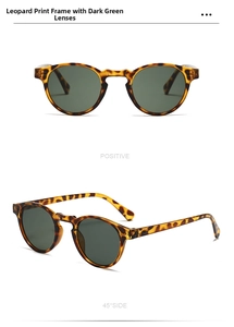 Détail de lunettes de soleil rondes rétro à motif léopard avec verres vert foncé