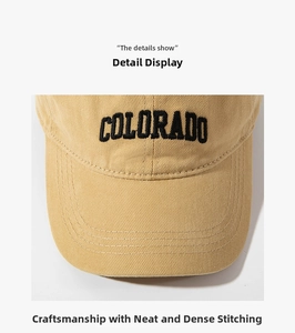 Detail of khaki cotton baseball cap showing black Colorado embroidery and reinforced stitching