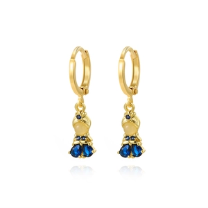 Golden doll earrings with yellow spherical head and blue zircon dress on white background