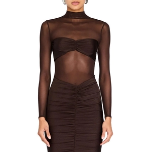 Detail showing sheer mesh panels and pleated ruched texture on long sleeve brown dress