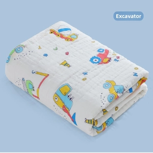 Detail view of 6-layer cotton gauze baby blanket with colorful excavator and tractor prints
