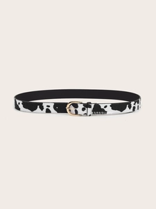 Close-up of cow print faux hair belt with a polished gold-tone metal pin buckle