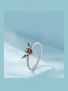 Detailed S925 silver ring featuring a red heart gemstone and dark style wings design