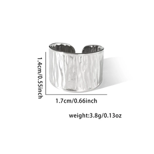Detail showing bark texture on wide silver titanium steel open ring with measurements