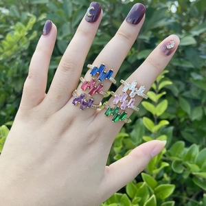 Chic 18K gold plated copper rings with rectangular colorful zircons on a model hand