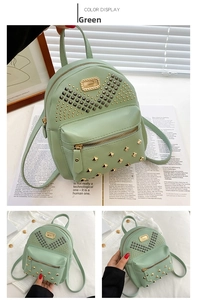 Detail of mint green PU leather mini backpack with metal studs and zipper pocket