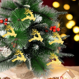 Golden reindeer Christmas tree ornaments with glitter finish on a festive branch