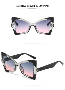 Detail of butterfly cat eye sunglasses featuring blue pink gradient lenses and C4 frame