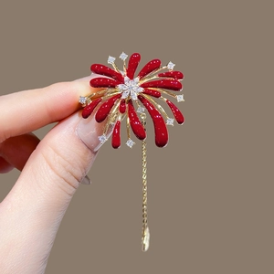 Elegant rhinestone firework tassel brooch with red enamel petals in golden finish