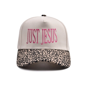 Baseball cap with leopard print brim and pink JUST JESUS embroidery on cream crown