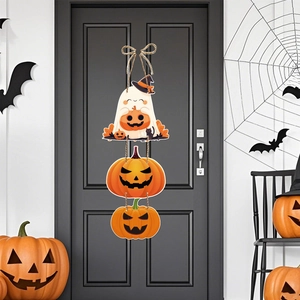 Halloween hanging decor featuring pumpkin and ghost wooden signs on a dark gray door