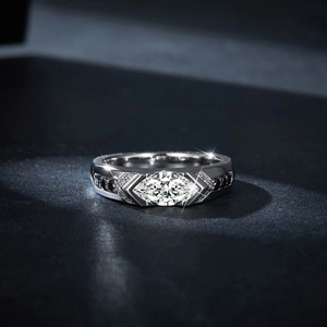 Marquise cut moissanite ring in sterling silver with black and white accent stones
