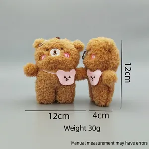 Plush brown bear keychain with pink heart patch and curly lamb wool texture, 12cm size