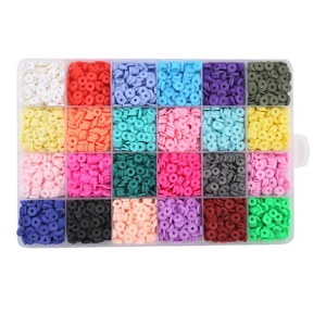 Flat lay of 24-grid organizer box with 4000 pieces of colorful clay spacer beads for DIY craft