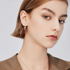 Elegant gold drop earrings with round moissanite stones on 925 sterling silver base