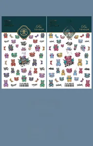 Detail of 5D embossed nail stickers featuring cartoon devil bear and wing patterns