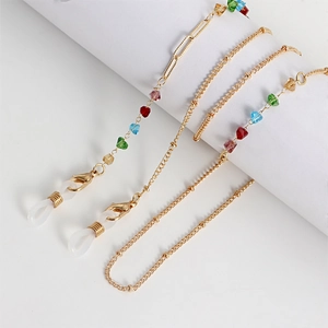 Detail of colorful beaded metal chain with golden lobster clasps and non-slip rubber loops