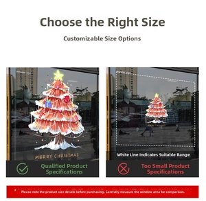 Detail view of red Christmas tree window stickers with Merry Christmas text on glass