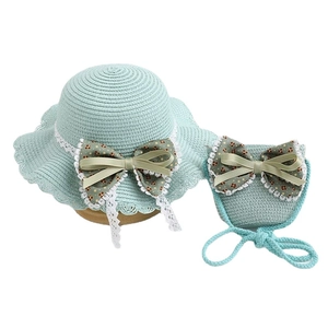 Kids straw hat and bag set with mint green floral bow and lace trim for summer sun protection