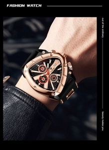 Close-up of a men's triangular quartz watch featuring a luminous black and gold dial