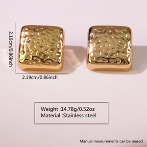 Detail view of gold textured square earrings with dimensions and stainless steel material