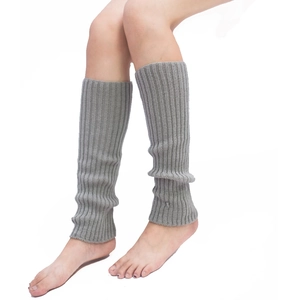 Close-up of grey rib-knit leg warmers showing soft wool texture and knit details
