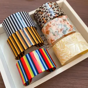 Colorful vertical striped acrylic open cuff bracelets with leopard and marble patterns