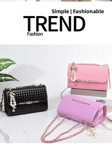 Detailed view of woven flap handbags with gold chains and pearl bow pendants