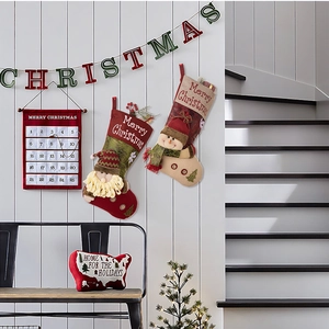Christmas decoration set with stockings, countdown calendar, banner and festive pillow