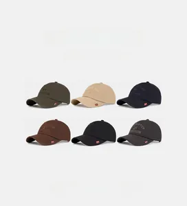 Collection of six cotton baseball caps with MATCH DESIGN embroidery in various colors