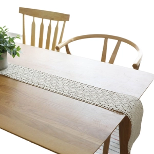 Handmade beige cotton linen crochet table runner with lace pattern for rustic dining decor