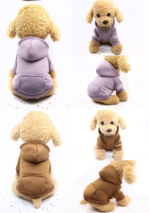 Detail view of purple and brown hooded pet sweatshirts with pocket and ribbed cuffs