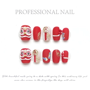 New Year press-on nails featuring 3D lion dance relief in red and white matte finish