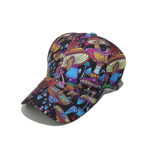 Detail view of the colorful psychedelic mushroom print on a black canvas baseball cap