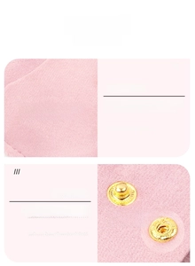 Close-up of pink velvet jewelry pouch with elegant gold snap button detail