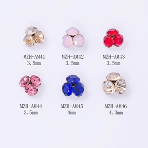 Mini alloy nail art crystal clusters in six colors ranging from 3.5mm to 4.3mm sizes