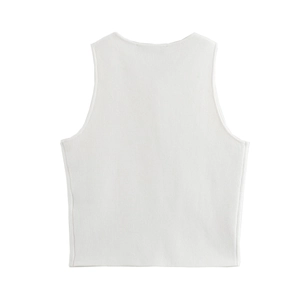 Close-up of a white knitted sleeveless crop vest showing high-quality fabric texture