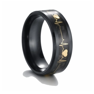 Detail of 8mm black titanium ring with carbon fiber inlay and golden heartbeat ECG pattern
