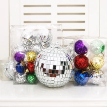 Silver disco mirror balls and multi-colored mini sets for holiday decorations
