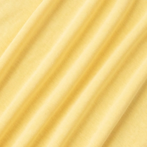 Detail shot of light yellow knit fabric showing soft rib texture and elegant drape