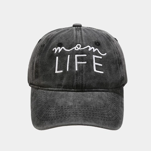 Detailed embroidery of white mom LIFE lettering on dark gray washed cotton baseball cap