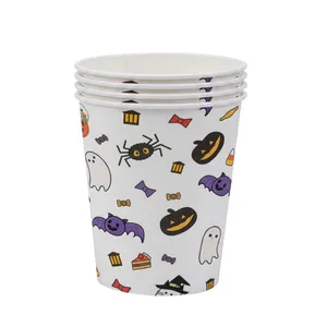 Macro shot of Halloween disposable paper cups with cartoon ghosts, pumpkins and bats