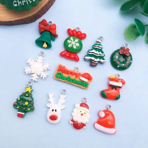 Detailed set of 11 colorful Christmas resin charms including reindeer, bells and trees