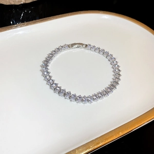 Silver tennis bracelet featuring marquise-cut zircons in a continuous pavé setting